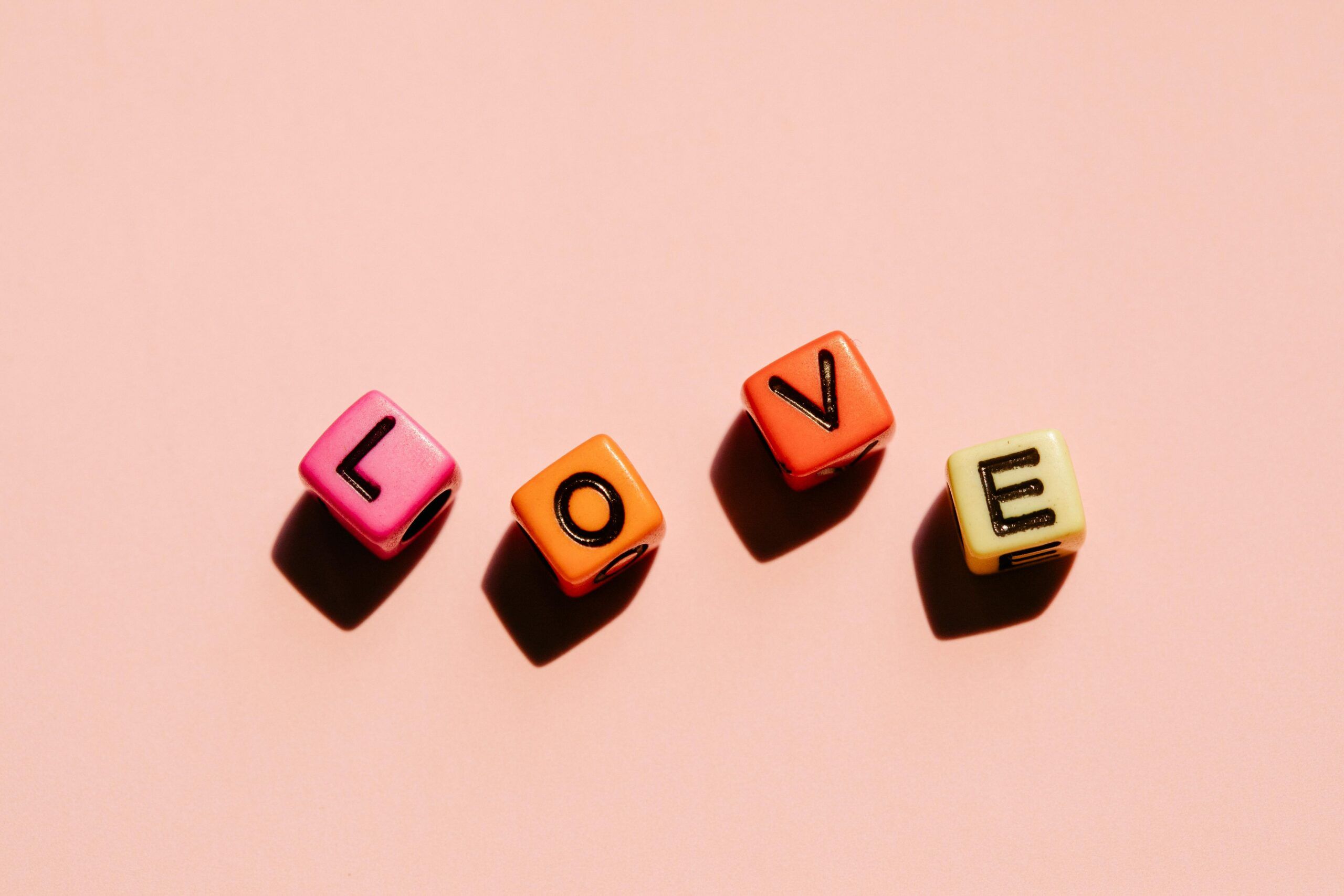 pexels-michelle-leman-6765961 (1) Cube letters spelling out the word Love